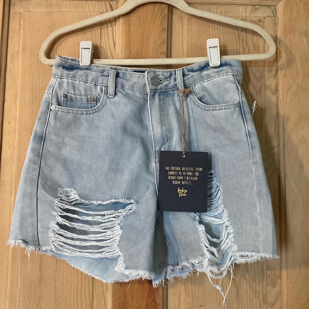 High waisted, recycled denim shorts by Indigo Rein. Side 3, tags, never worn.
